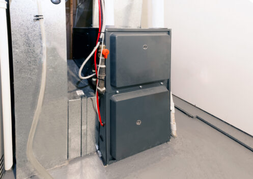 A home high energy efficient furnace in a Windsor basement